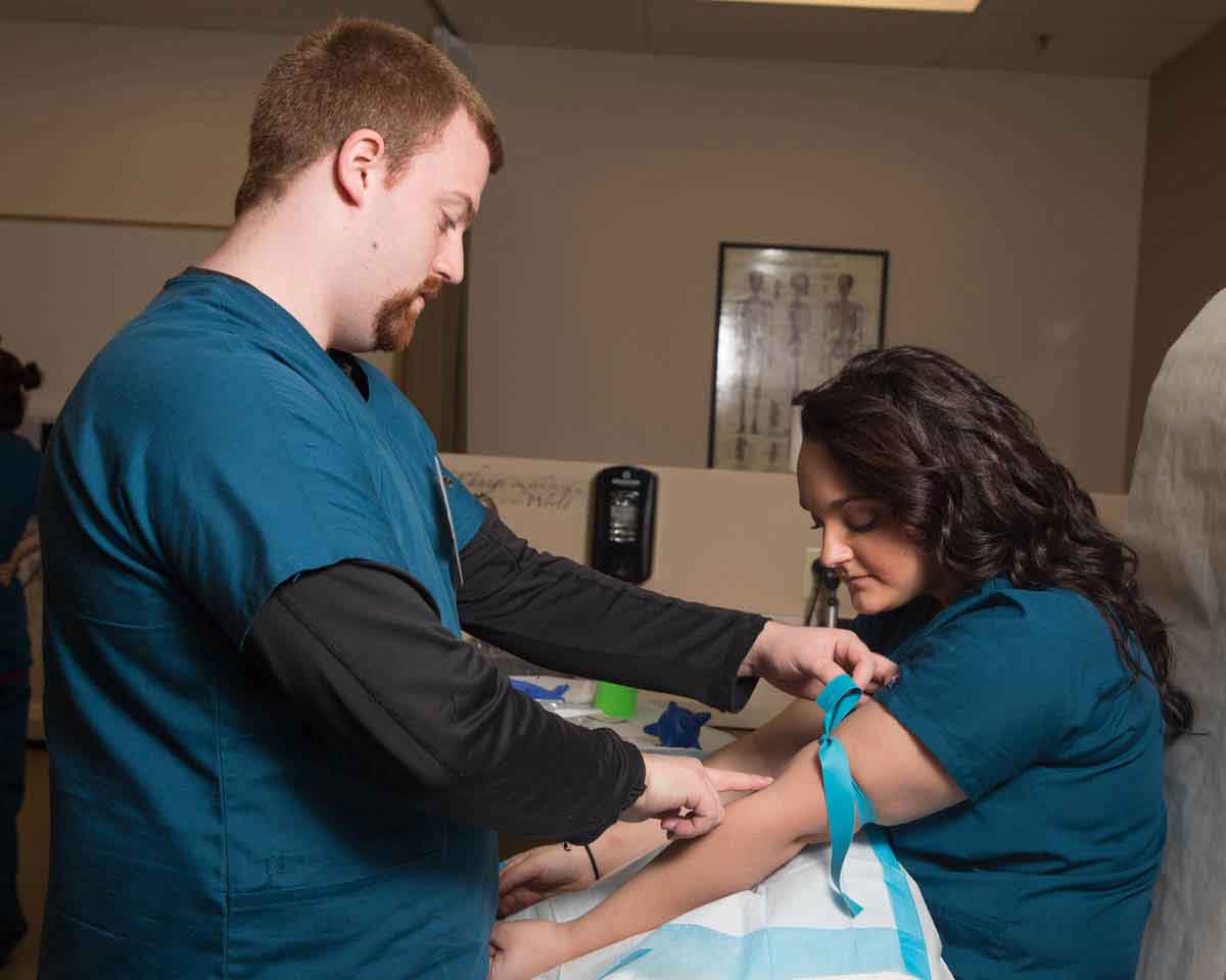 Medical assistants working in a medical office